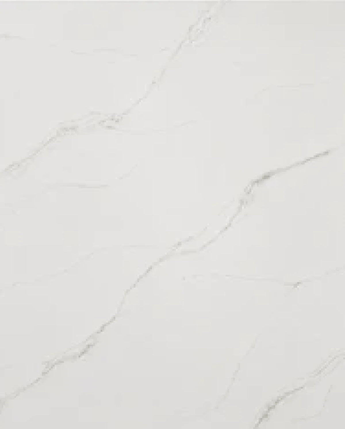 Calacatta Alba Quartz surface with a bright white background and delicate warm gold veining