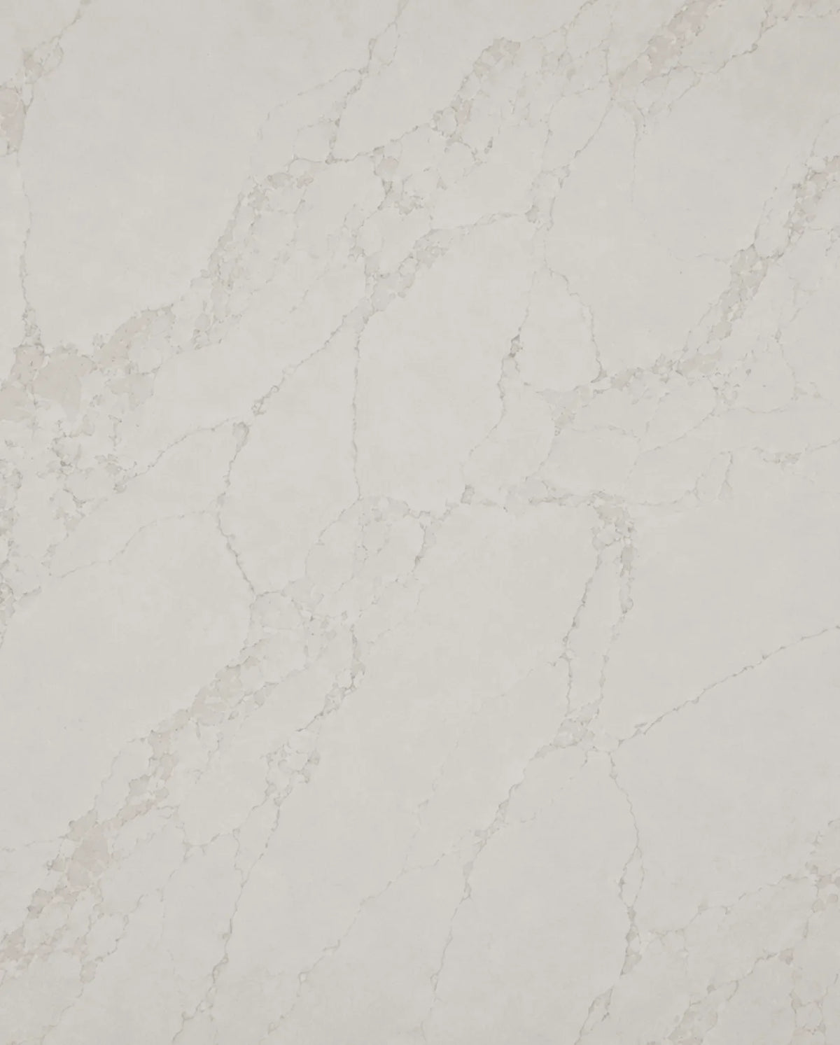 Calacatta Eterna Quartz surface with a warm white background and delicate beige marble-style veining