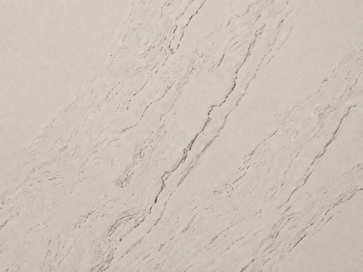 Detailed view of Casablanca Quartz with warm ivory color, fine diagonal movement and restrained crystalline highlights