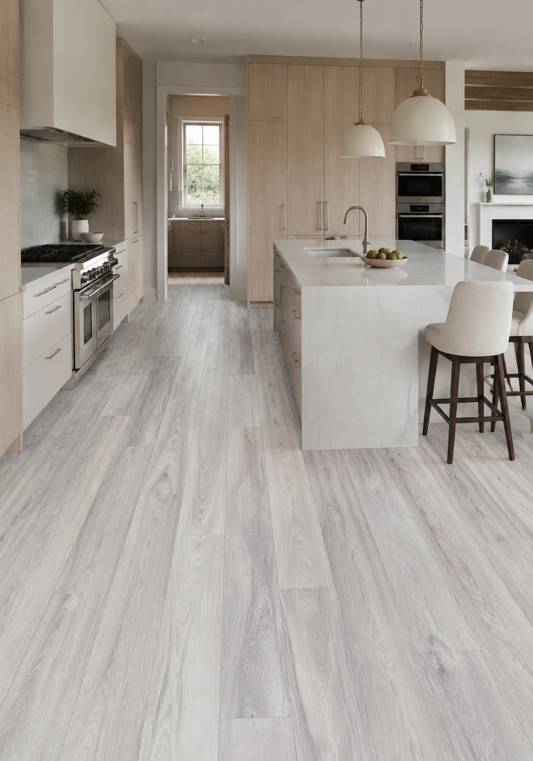 Coastal Gray SPC flooring in a light open-concept modern kitchen