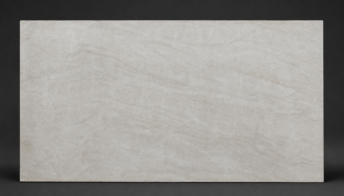 Full slab of light beige quartz with soft horizontal movement and understated natural stone texture