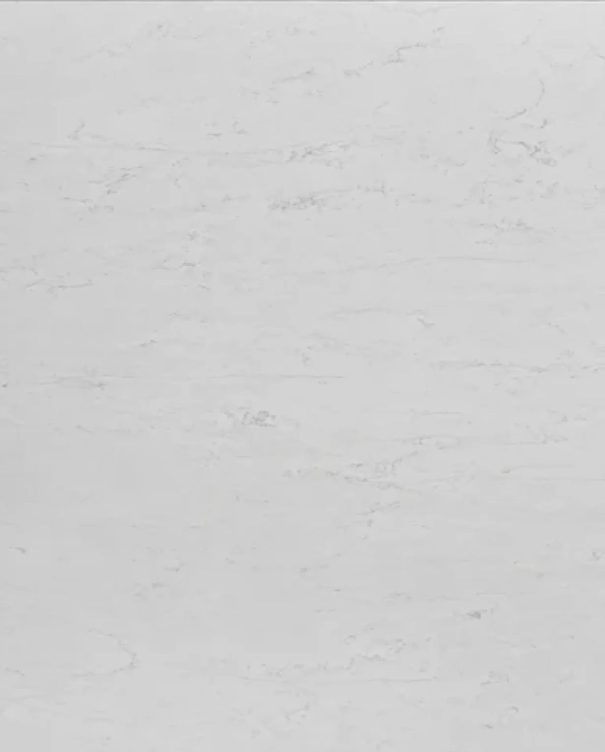 Bianco Horizon Quartz surface with a bright white background and subtle soft gray veining