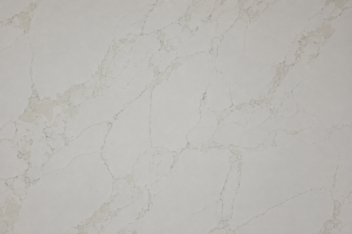 Detailed Calacatta Eterna Quartz pattern with warm neutral veins across a creamy white surface