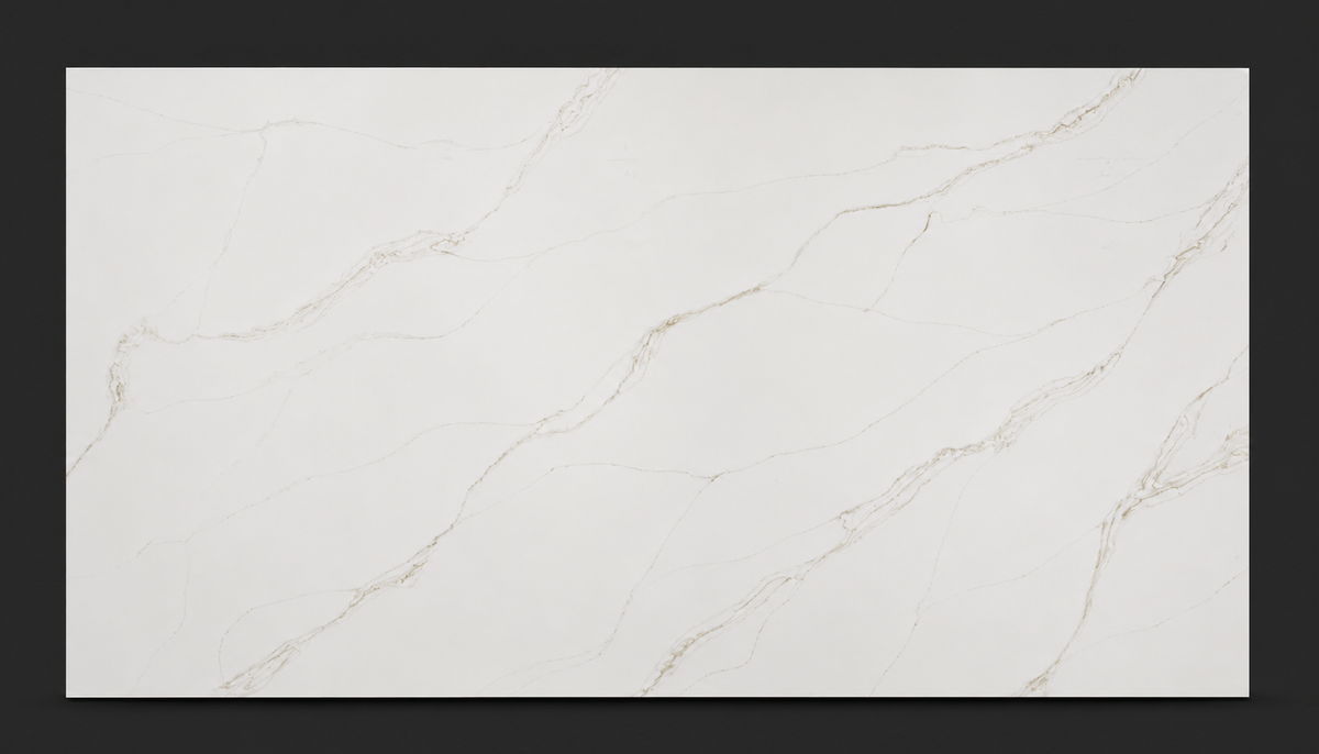 Full slab of Calacatta Alba Quartz with delicate gold veining across a clean white background