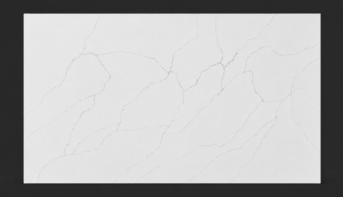 Full slab of Calacatta Everest Quartz with elegant flowing gray veins on a bright white background