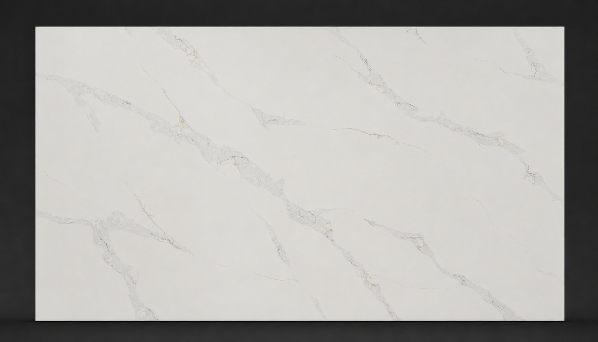 Full white quartz slab with soft diagonal gray veining and subtle warm accents