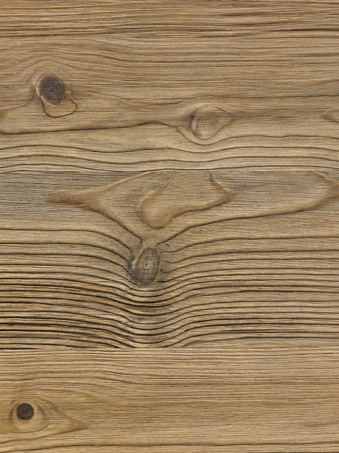 Close-up of Golden Oak flooring showing natural taupe-brown grain and knot detail